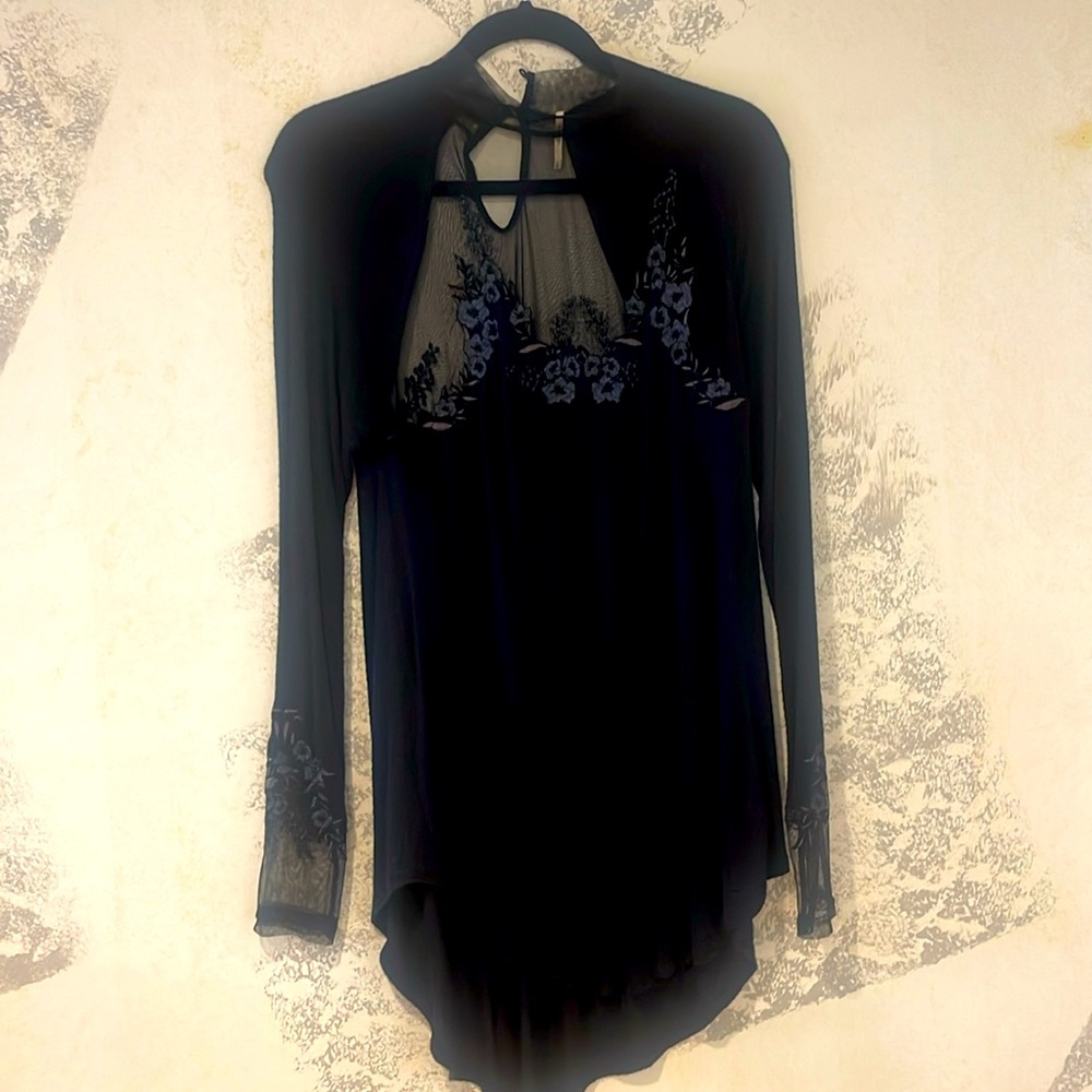 PERFECT FOR THE HOLIDAYS. See through on the top with embroidery.